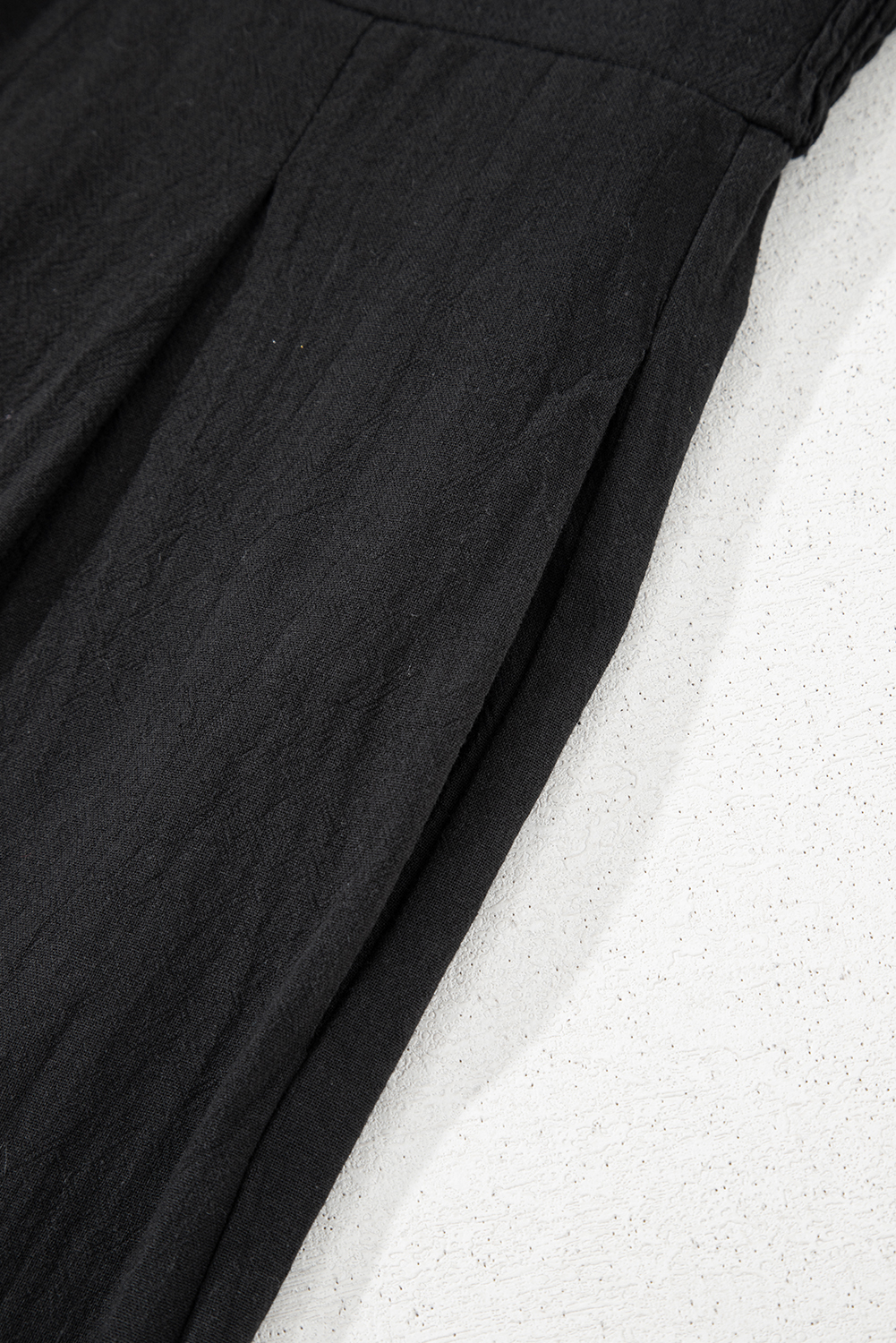 Black Front Cut Out Smocked Back Sleeveless Wide Leg Jumpsuit