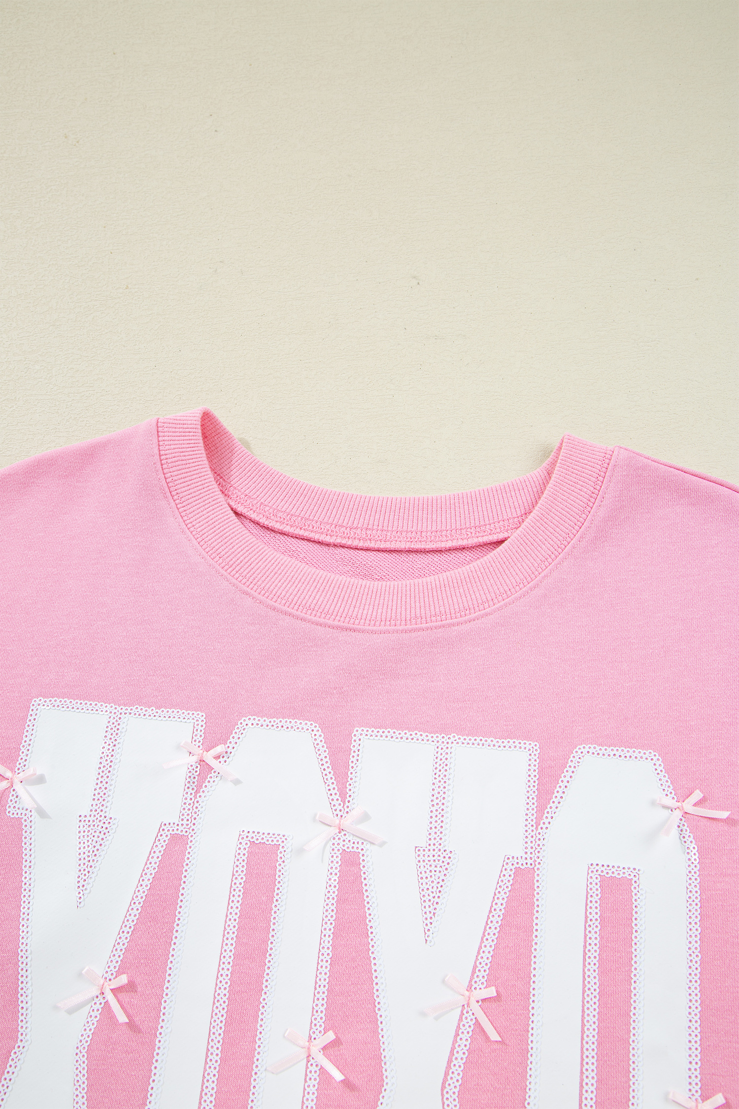 White Bow Sequin XOXO Letter Graphic Exposed Seam Baggy Sweatshirt