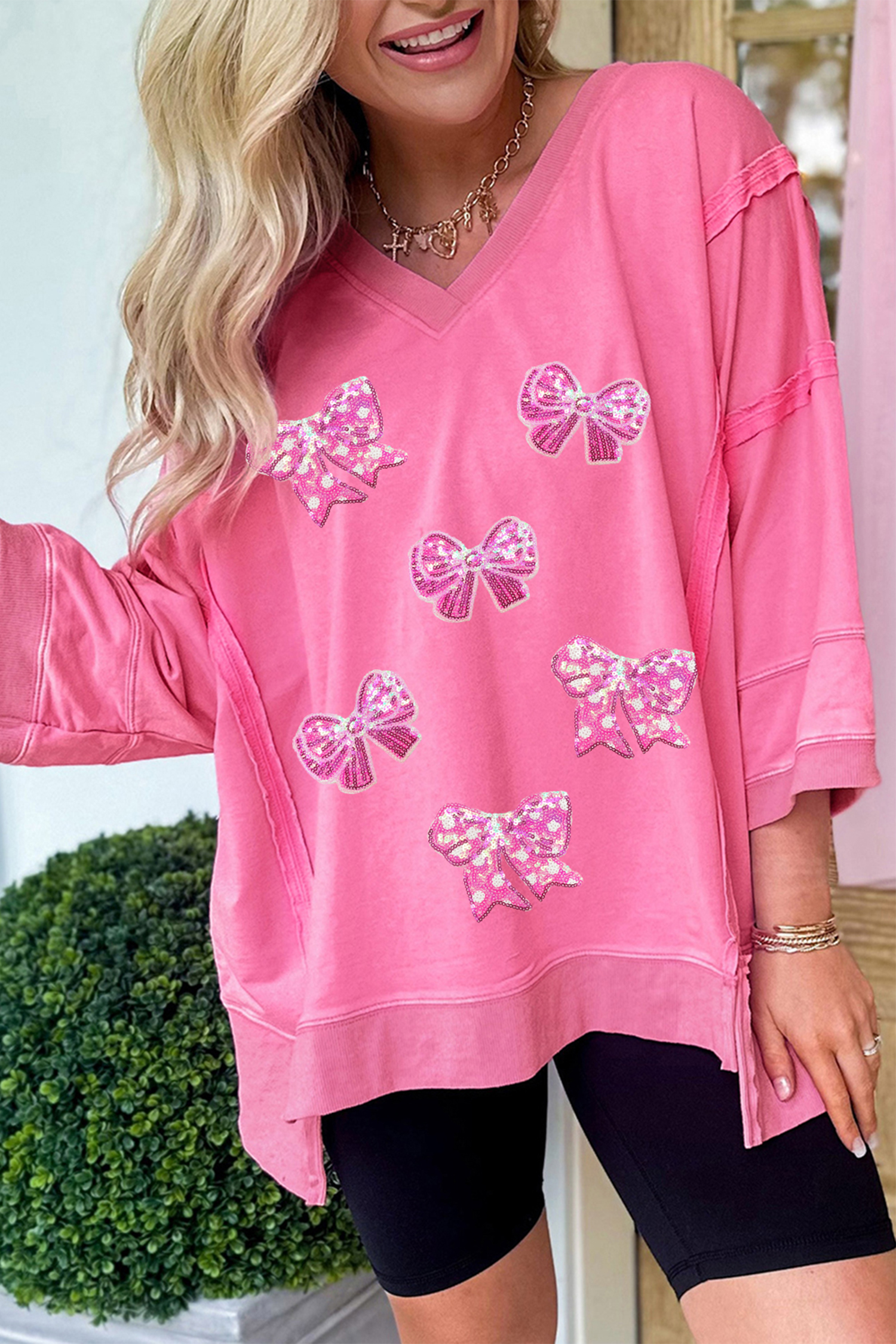Bonbon Sequined Bow Patched Exposed Seam Bracelet Sleeve High Low T Shirt