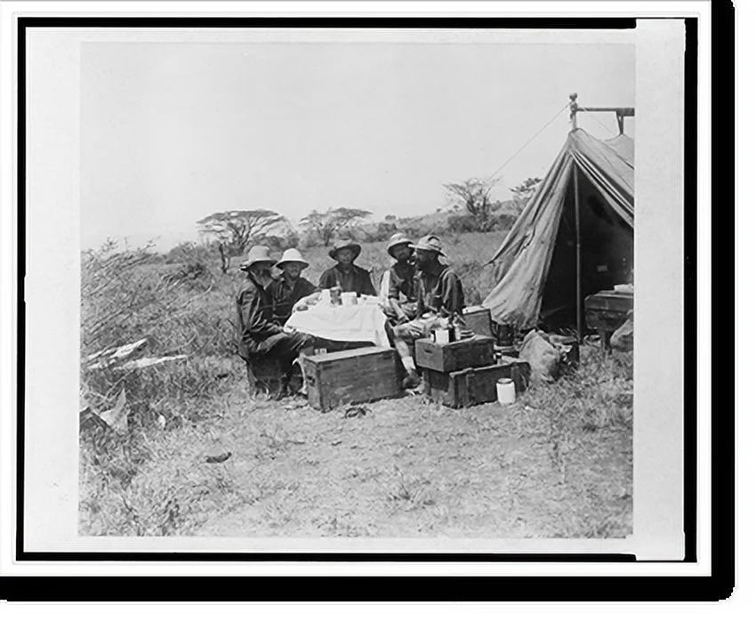 Historic Framed Print, [Edgar A. Mearns with Childs Frick and three men seated around makeshift table at campsite during Frick expedition to Abyssinia], 17-7/8