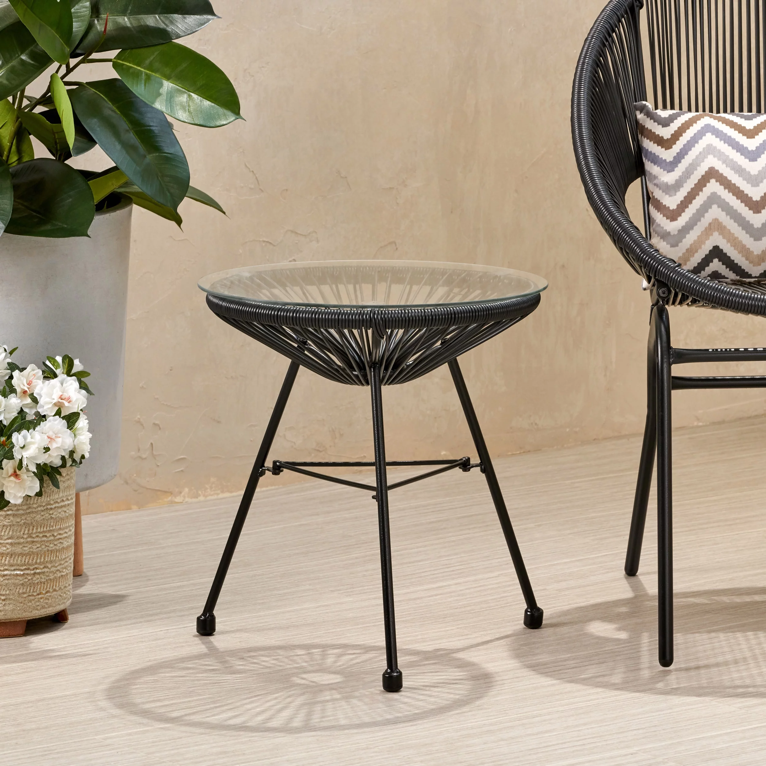 Noble House Nusa Outdoor Tempered Glass Top Faux Rattan Side Table in Black