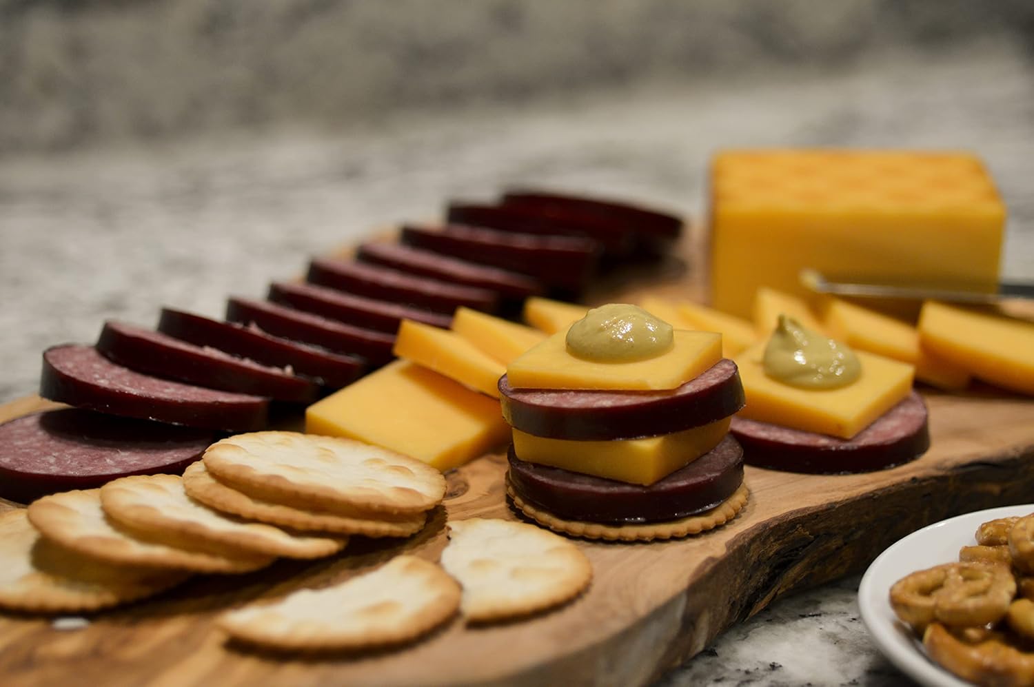 Sausage and Cheese Tasting Sampler by Dan the Sausageman. Featuring Smoked Beef Summer Sausage, and Specialty Sweet Hot Mustard.