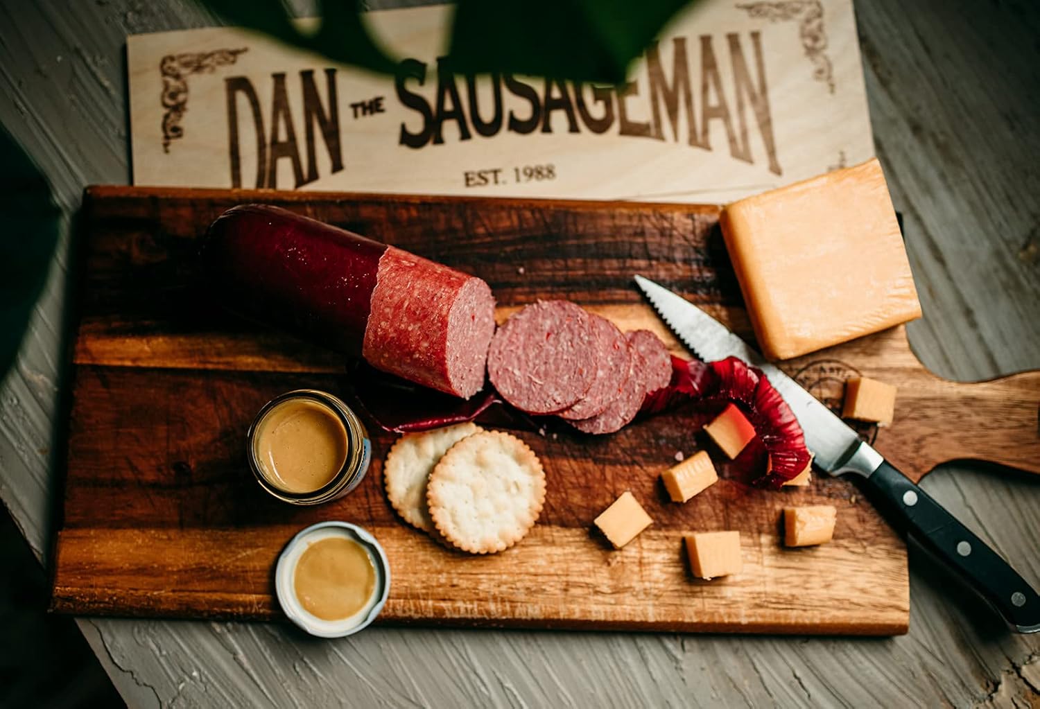 Sausage and Cheese Tasting Sampler by Dan the Sausageman. Featuring Smoked Beef Summer Sausage, and Specialty Sweet Hot Mustard.