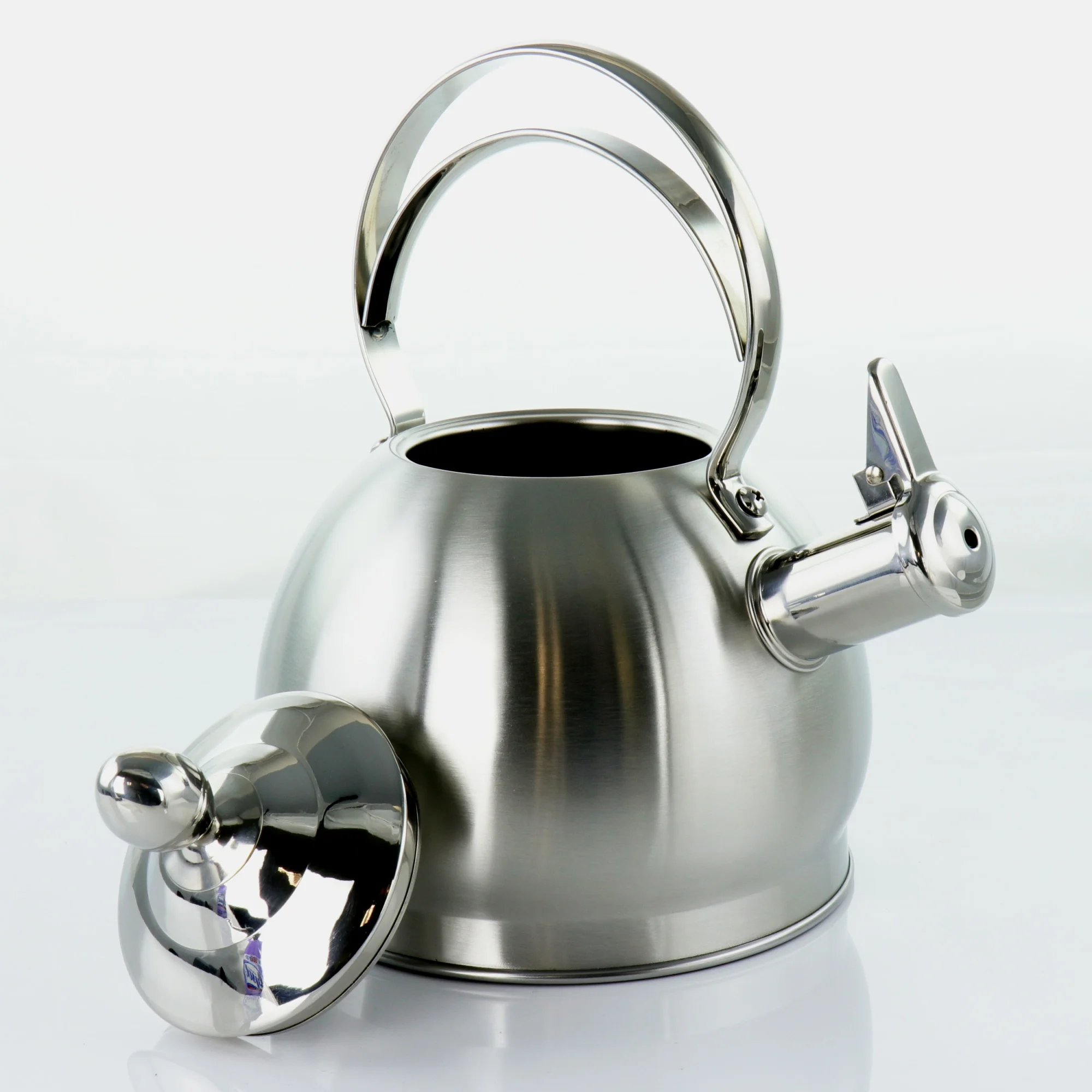 MegaChef 2.8 Liter Round Stovetop Whistling Kettle in Brushed Silver
