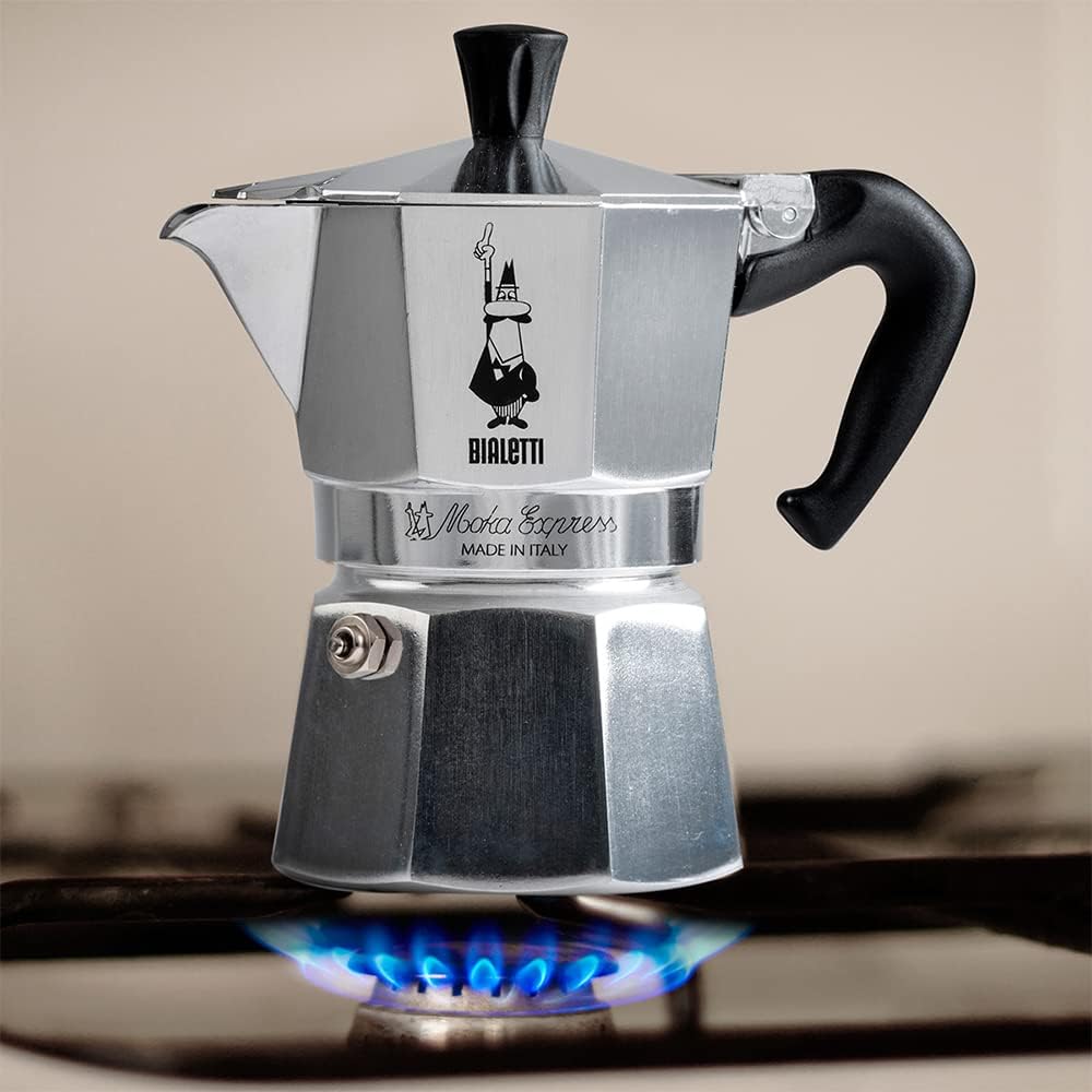 Moka Express: Iconic Stovetop Espresso Maker, Makes Real Italian Coffee, Moka Pot 3 Cups (4.4 Oz - 130 Ml) , Aluminium, Silver & Stainless Steel Plate, Heat Diffuser Cooking Induction Adapter, Steel