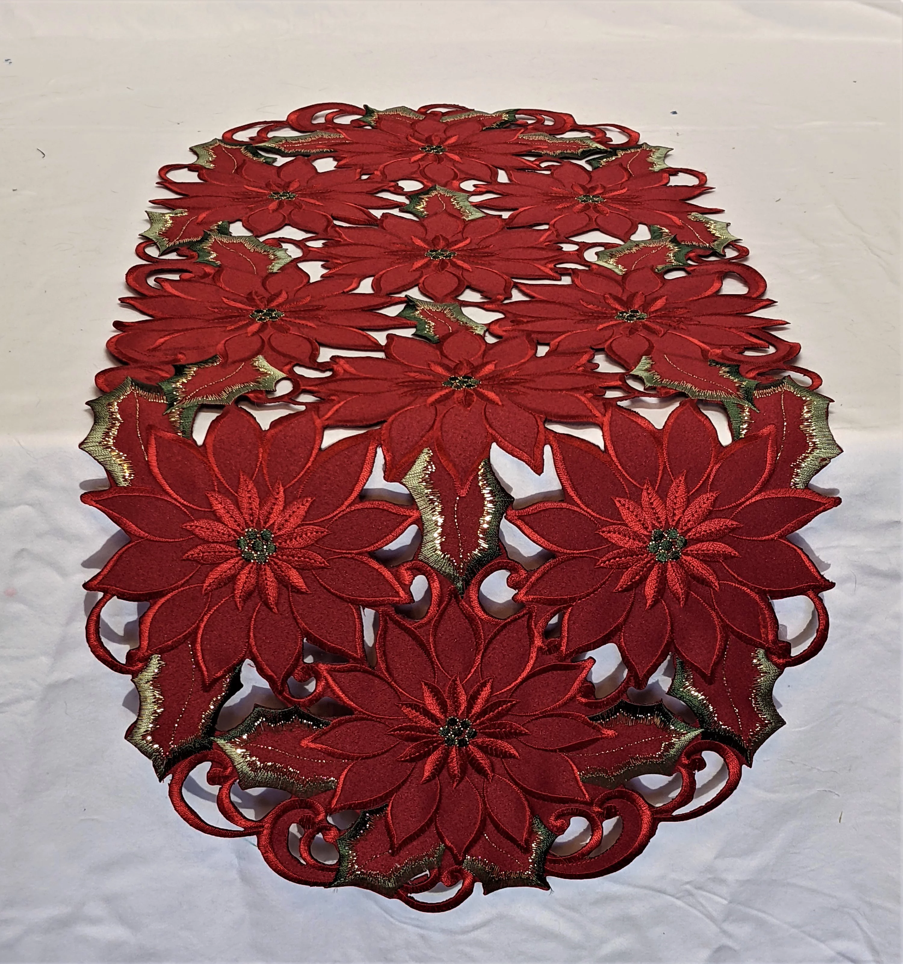 Doily Boutique Christmas Table Runner with Red Cutwork Poinsettias, Size 34 x 15 inches