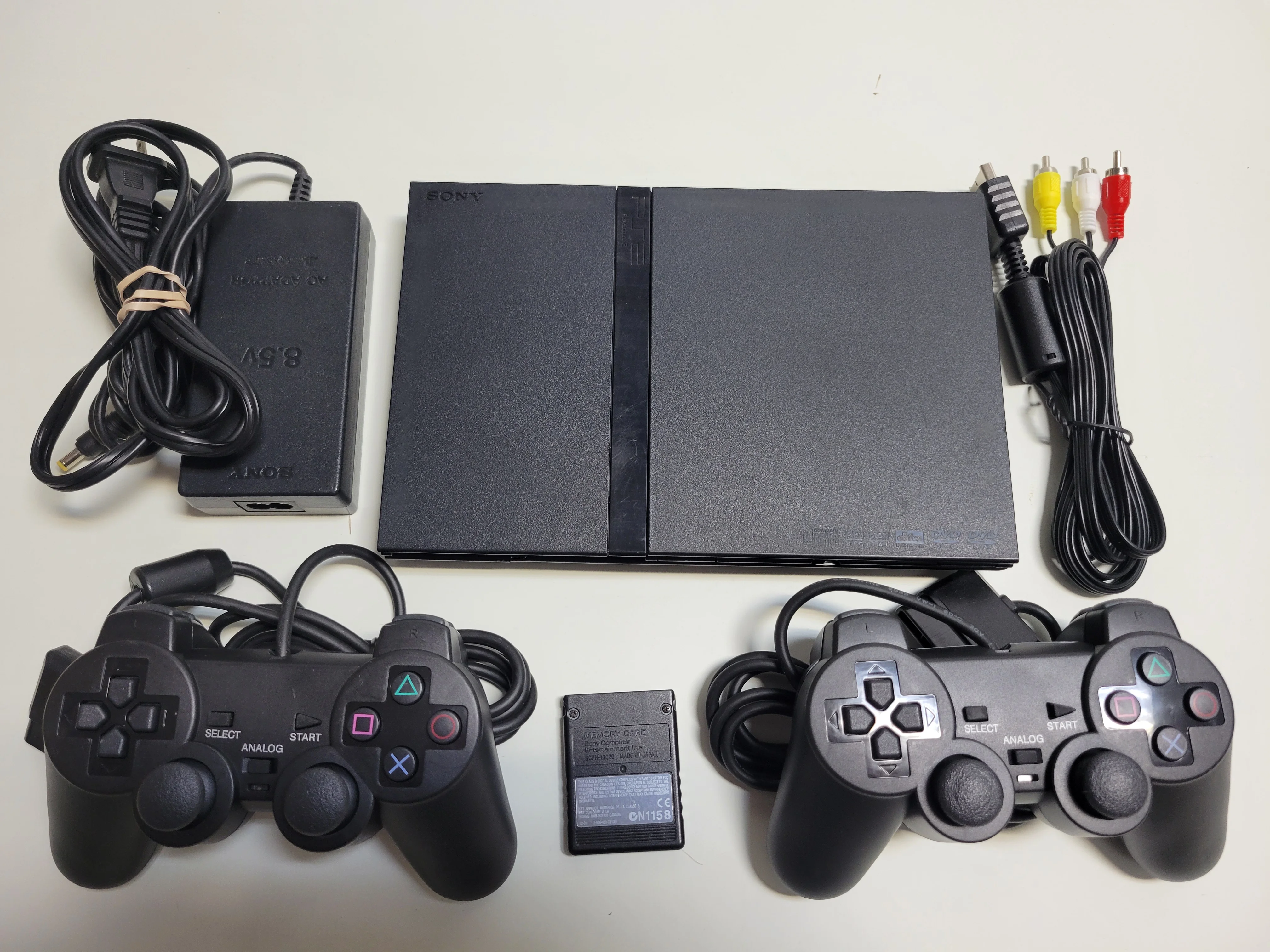 Pre-Owned Sony Playstation 2 PS2 Slim console with 2 BRAND NEW Controllers (Refurbished: Good) E