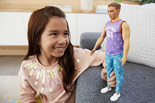 Barbie Ken Fashionistas Doll #165 with Sculpted Brown Hair Wearing Purple “Malibu” Top, Blue Starred Joggers & White Shoes, Toy for Kids 3 to 8 Years Old