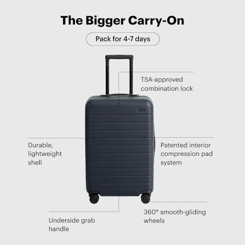 Away Bigger Carry-On Luggage, Lightweight Hardside Large Suitcase with Spinner Wheels, TSA Lock, Airline Approved, Navy Blue