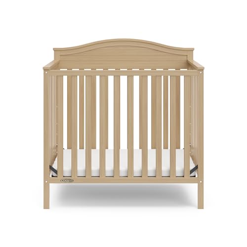 Graco Stella 4-in-1 Convertible Mini Crib with Bonus Mattress (Driftwood) – Includes Bonus 2.50 Inch Thick Mattress with Water-Resistant Cover, Converts to Twin Bed with Headboard and Footboard