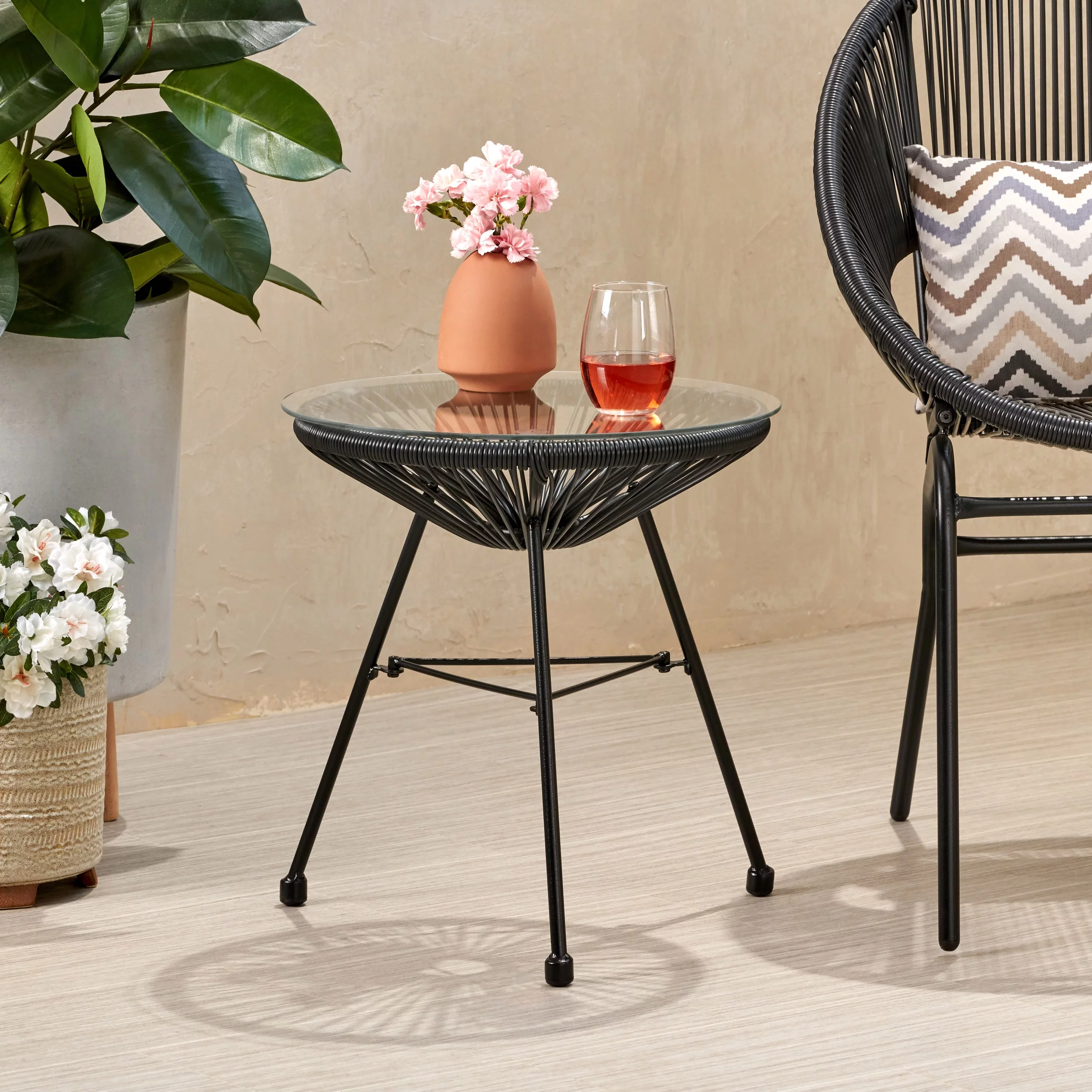 Noble House Nusa Outdoor Tempered Glass Top Faux Rattan Side Table in Black