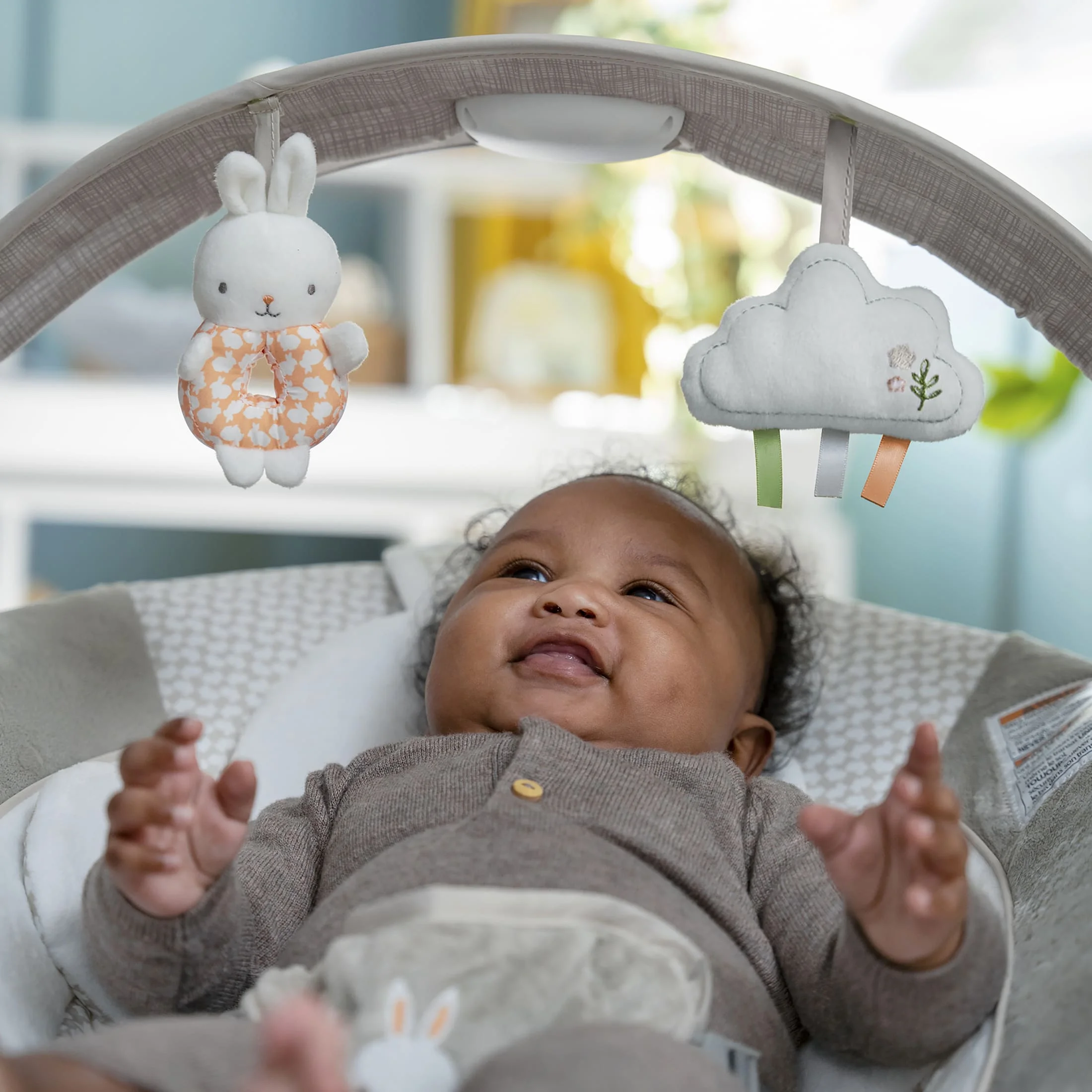 InLighten by Ingenuity Twinkle Tails Vibrating Infant Baby Bouncer with Lightning Toy Bar and Pillow