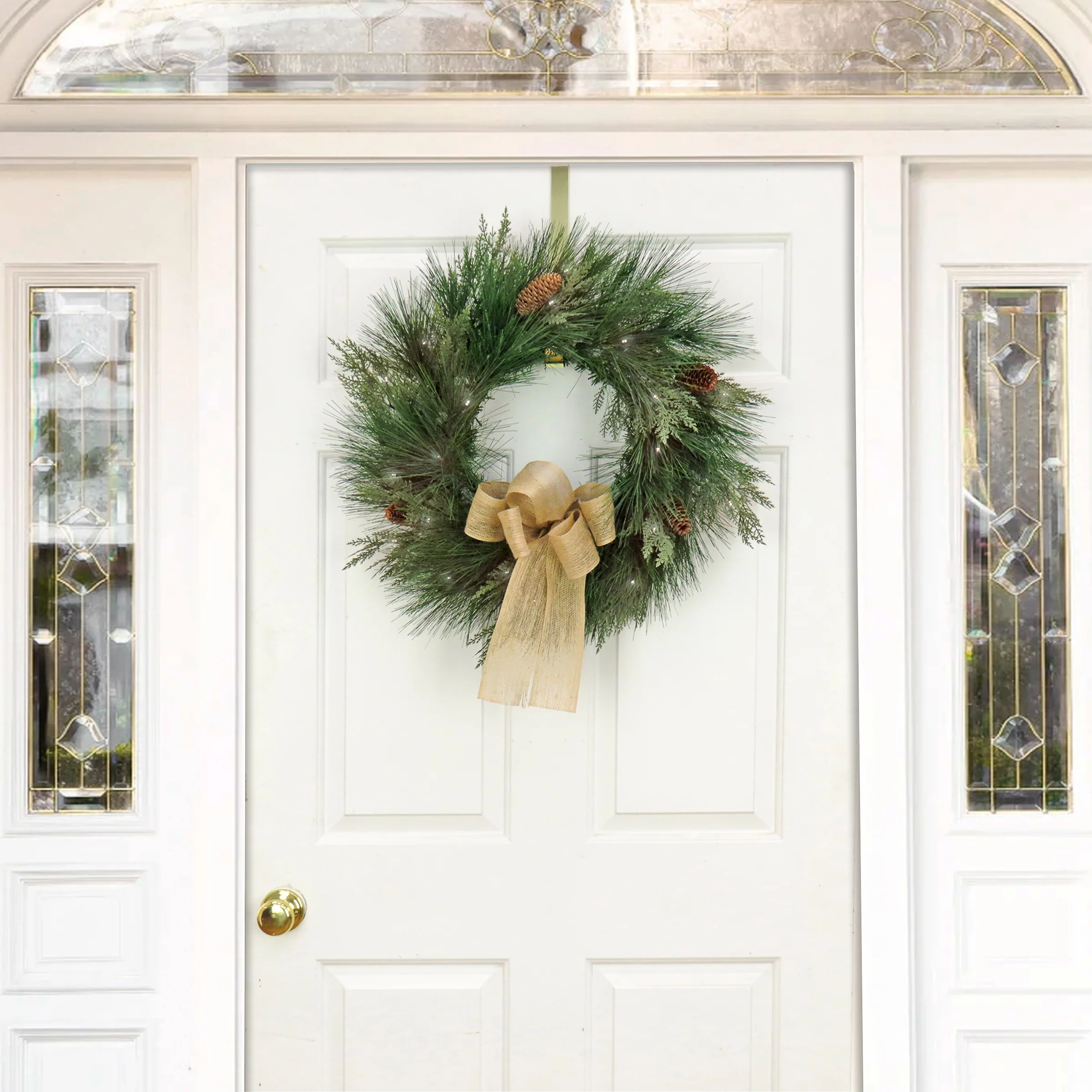 HGTV Home Collection Pre Lit Artificial Christmas Wreath, Mixed cedar and bristle Branch Tips	, Decorated with Pinecones and Bow, Battery Powered, 22 Inches