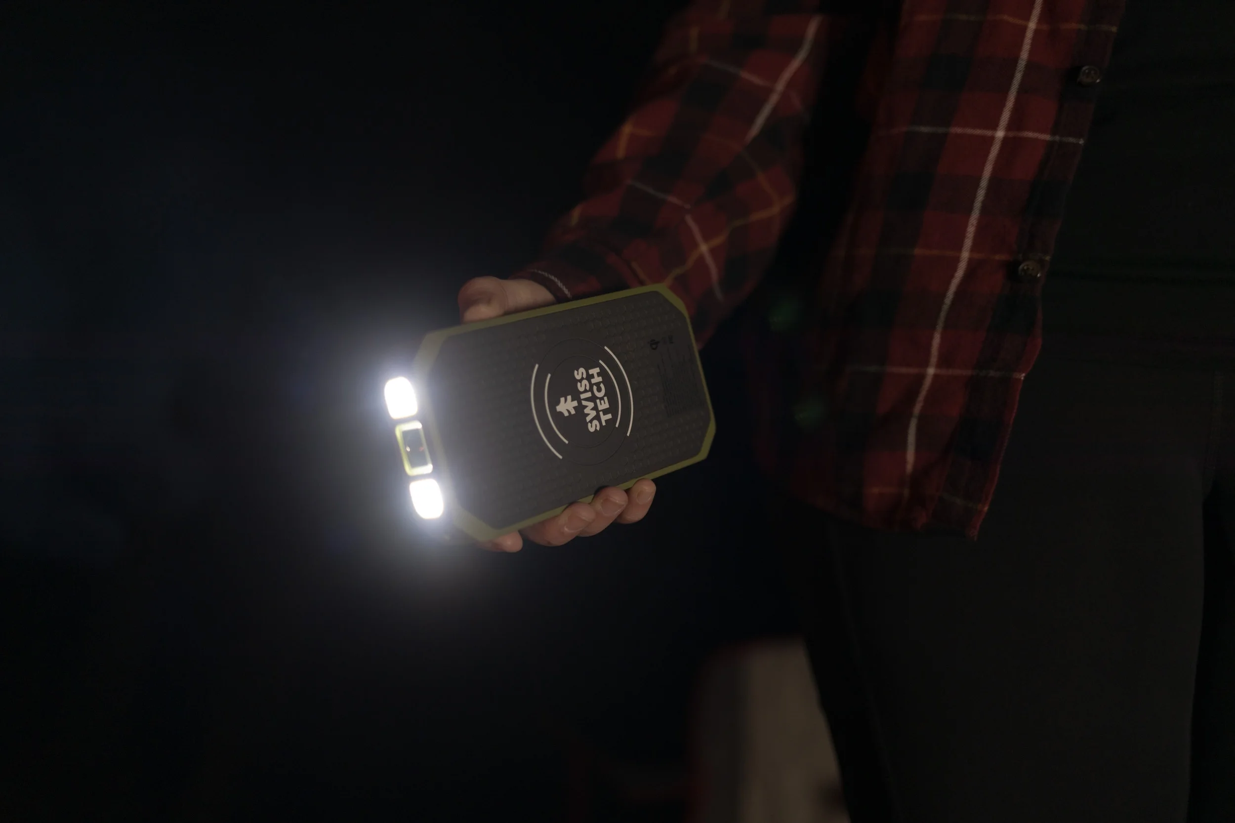 Swiss Tech 20000 mAh Wireless Power Bank with Flashlight and Charging Pad, IP54 Weatherproof