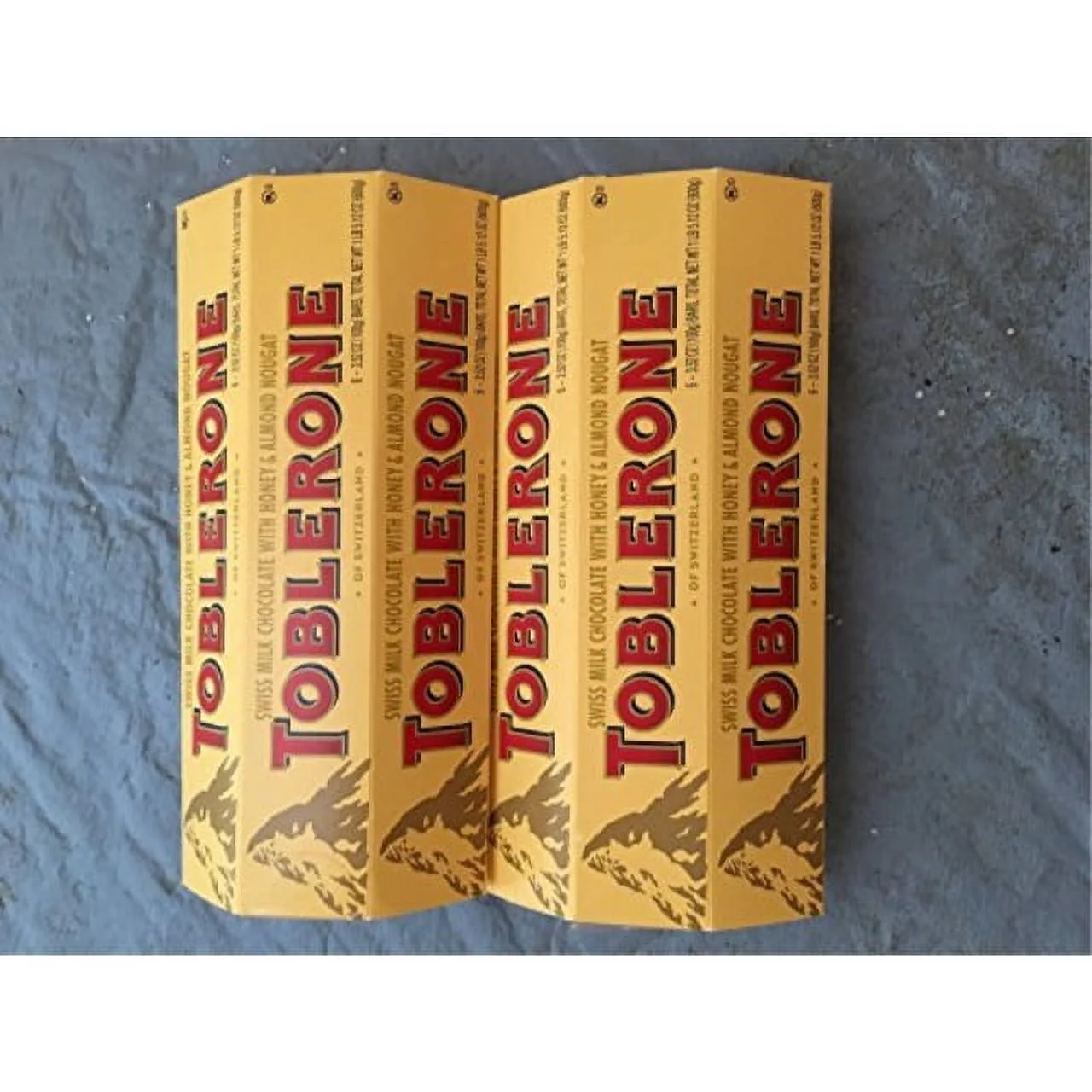 toblerone ( 2 pack )6-3.52oz ( 12 total bars ) of each of swiss milk chocolate with honey & almond nougat