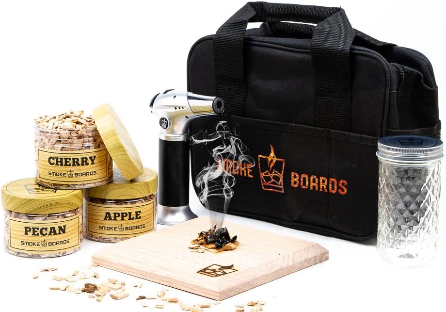 Smoked Cocktail Kit. The only Complete 7 Piece Home Bartender Kit with Carrying case and Torch Included! Handcrafted White Oak Smoking Board with 3 Different Wood Chips Including Mason jar and case.