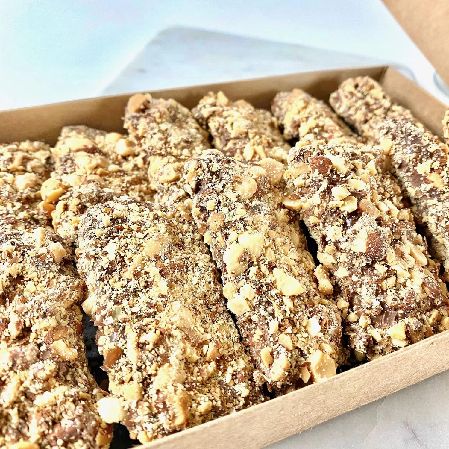 MalibuGift Gourmet English Toffee Candy rolled in Dark Chocolate and Roasted Almonds.