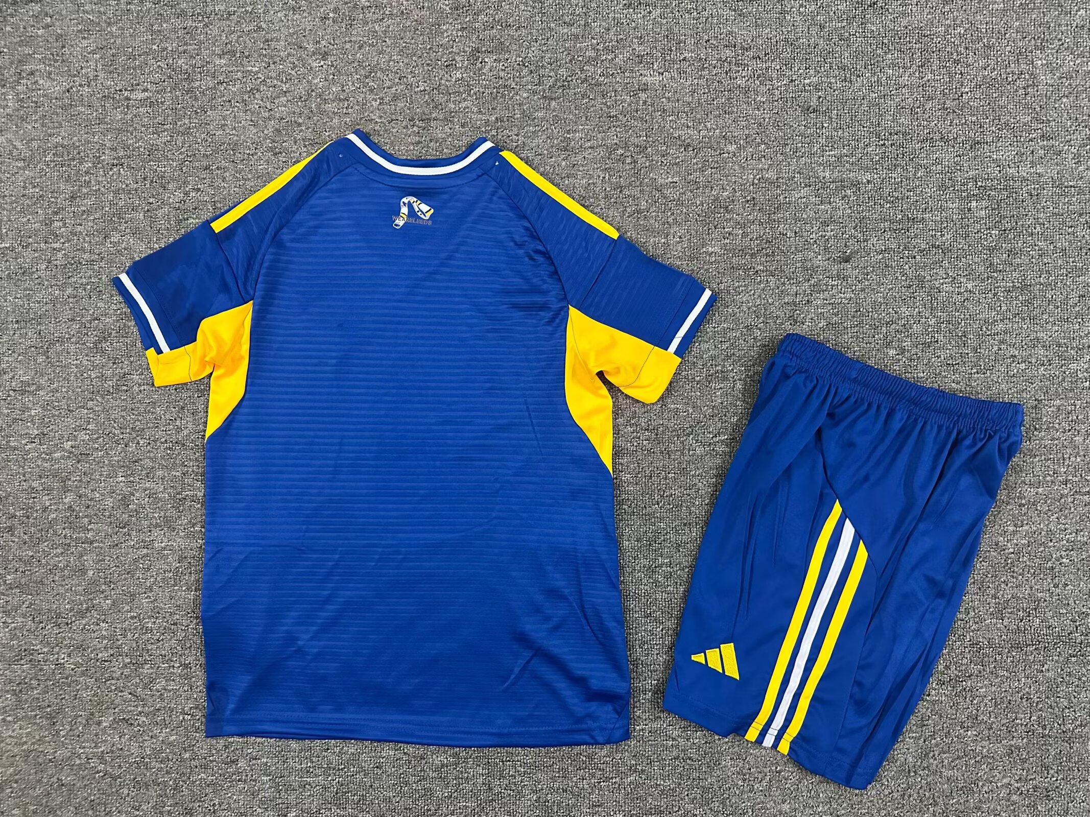 Leeds United 25/26 away kids jersey kit