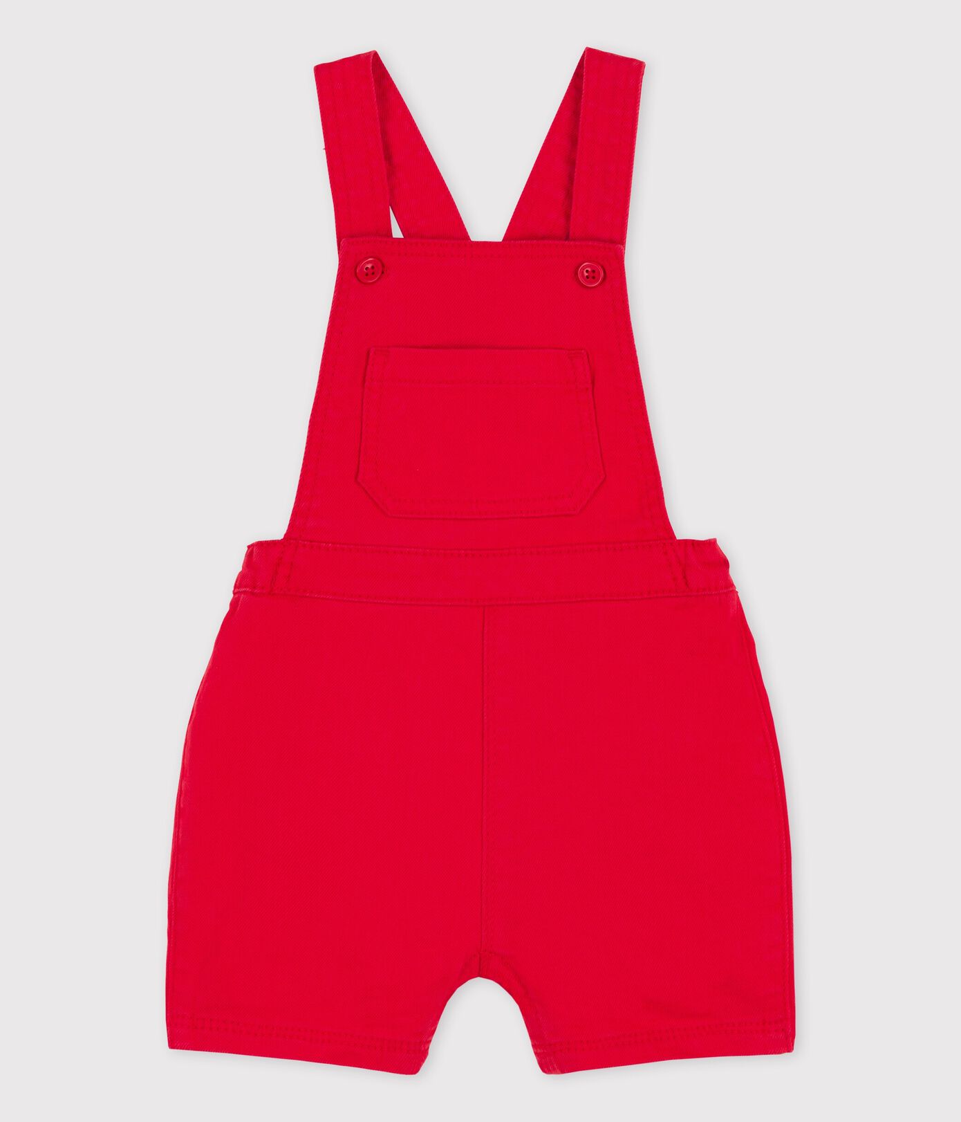 Salopette courte en denim coloré bébé