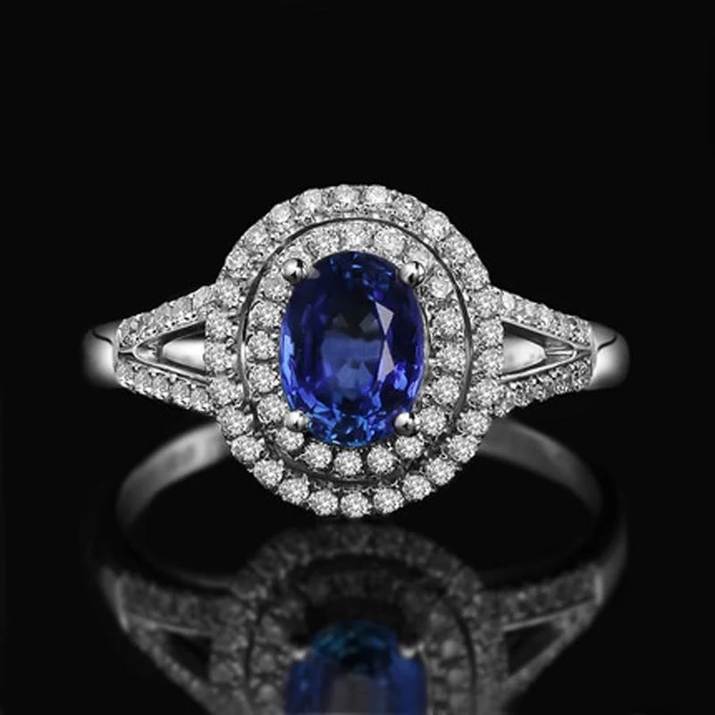 2 Carat 8x6mm Oval Cut Blue Sapphire And Moissanite Diamond Halo Engagement Ring in 10k White Gold
