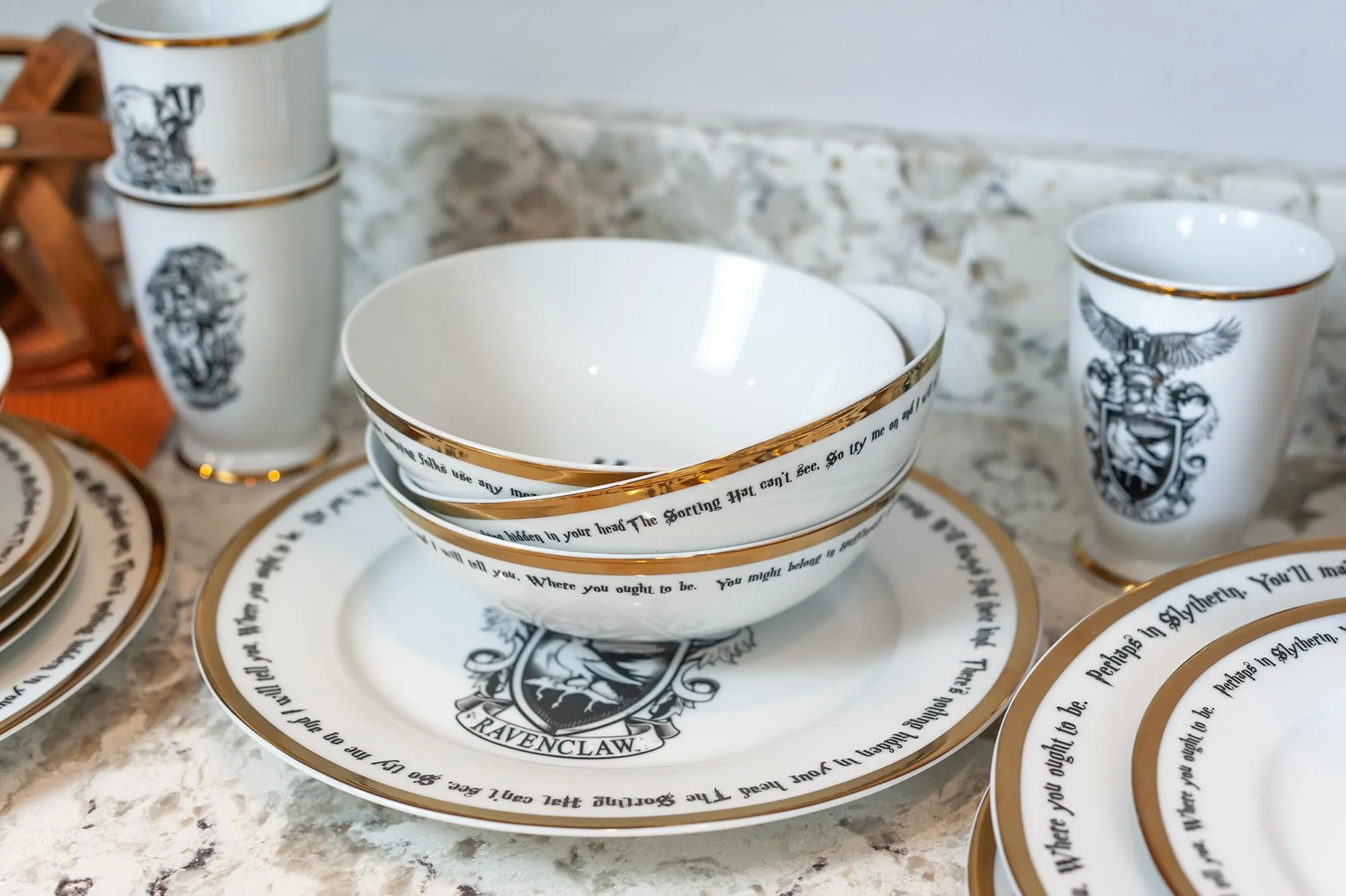 Harry Potter Hogwarts House Logos 16-Piece Ceramic Dinnerware Set