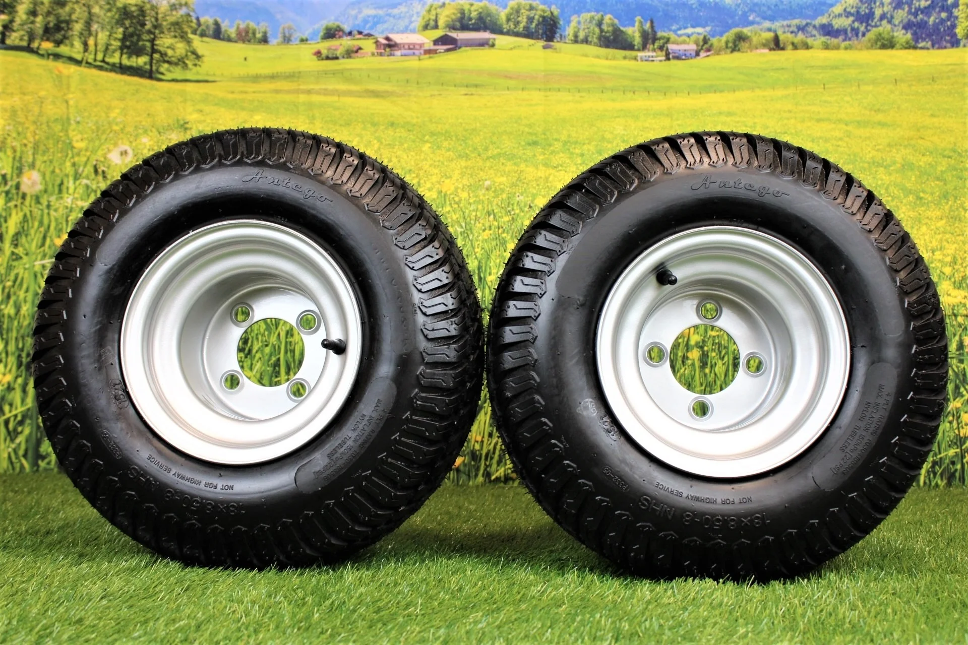 Antego Tire and Wheel (Set of 2) 18x8.50-8 with 8x7 Hustler Chrome Silver Assembly