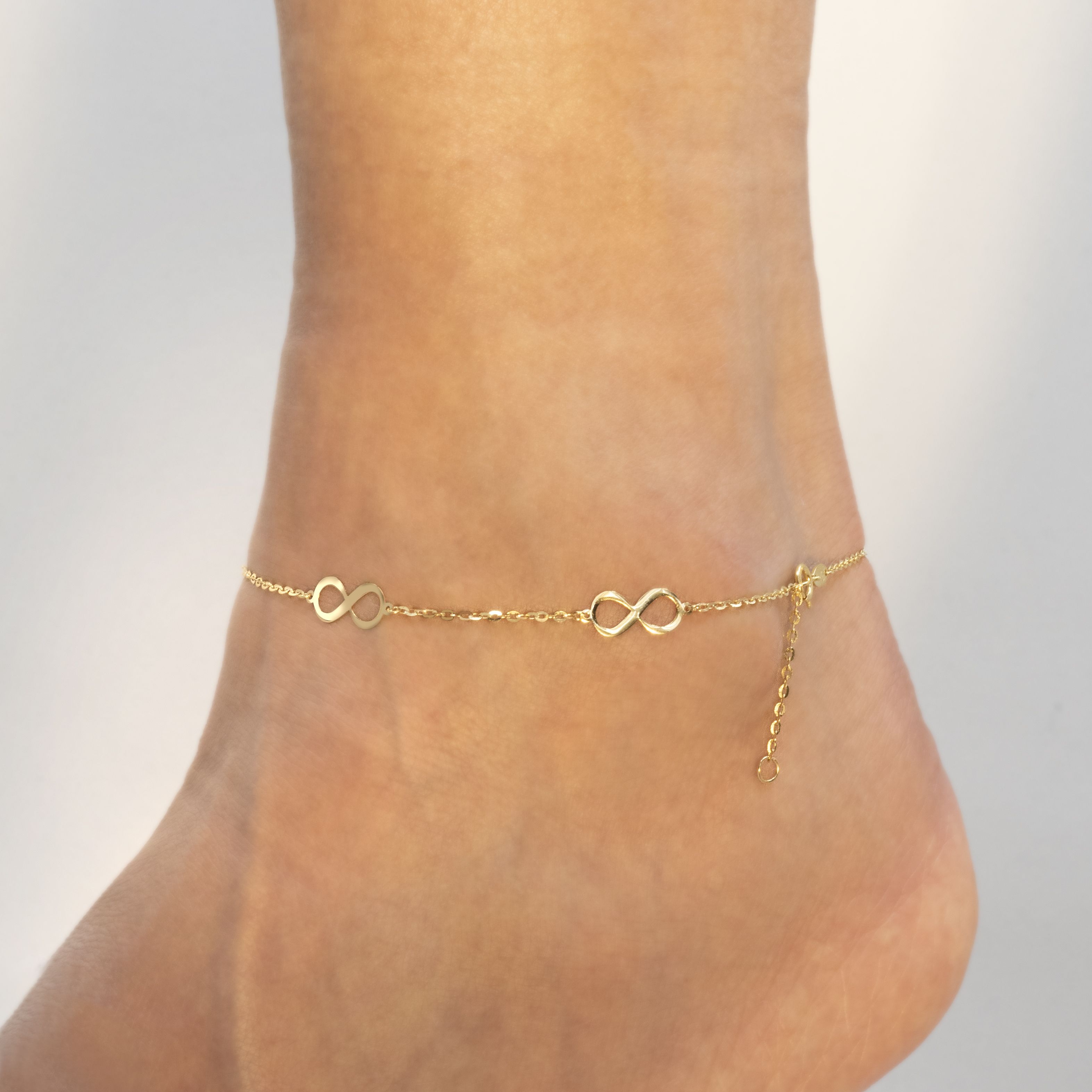 LoveBling 10k Yellow Gold 0.50mm Diamond Cut Rolo 5-Count Infinity Symbol Anklet, Adjustable 9