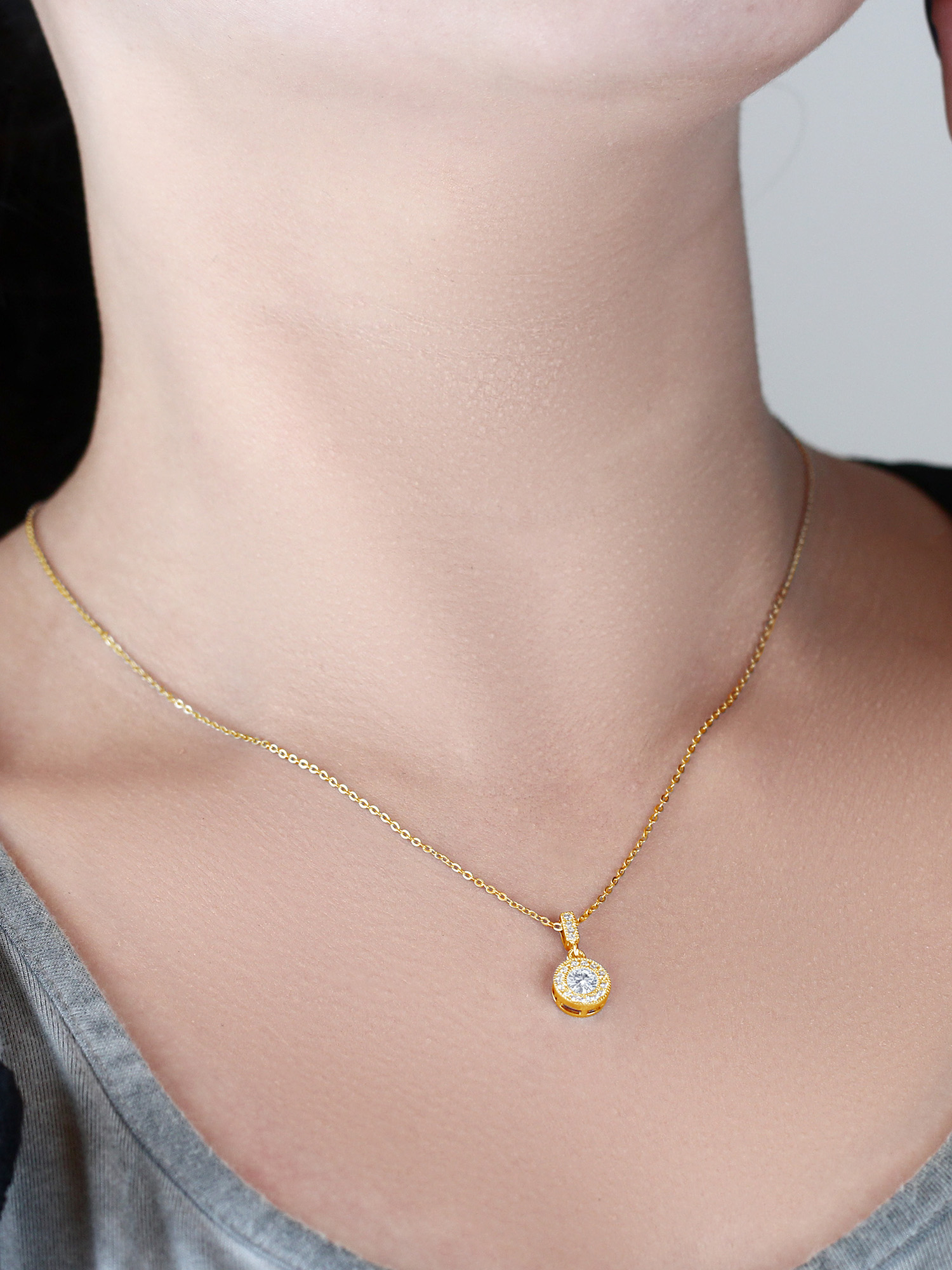 Gem Stone King 18K Yellow Gold Plated Silver Round White Moissanite and Created Sapphire Pendant with Chain (1.14 Cttw)