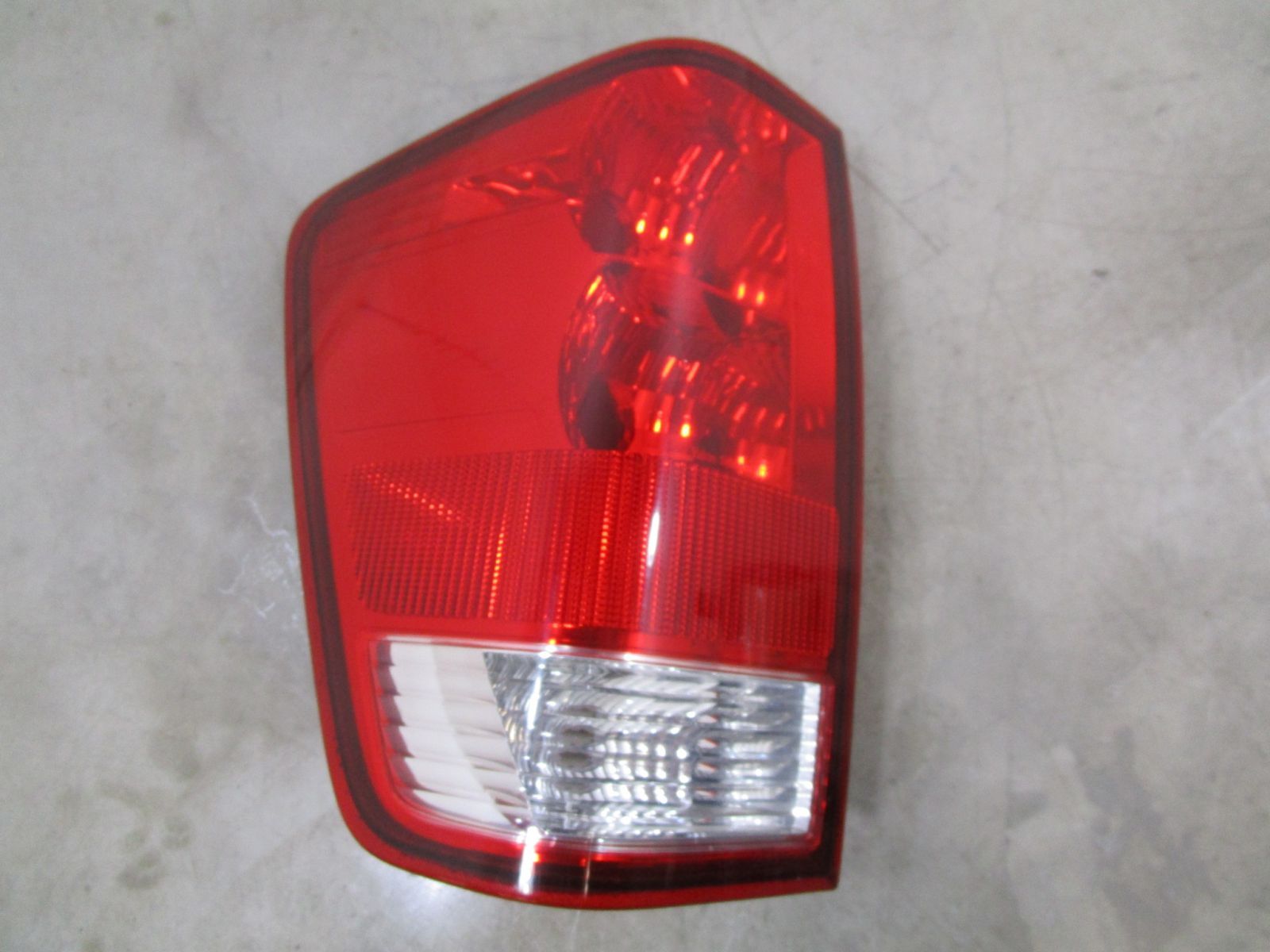 Pre-Owned 2004-2015 Nissan Titan LH Driver Taillight Tail Light Lamp OEM (Good)